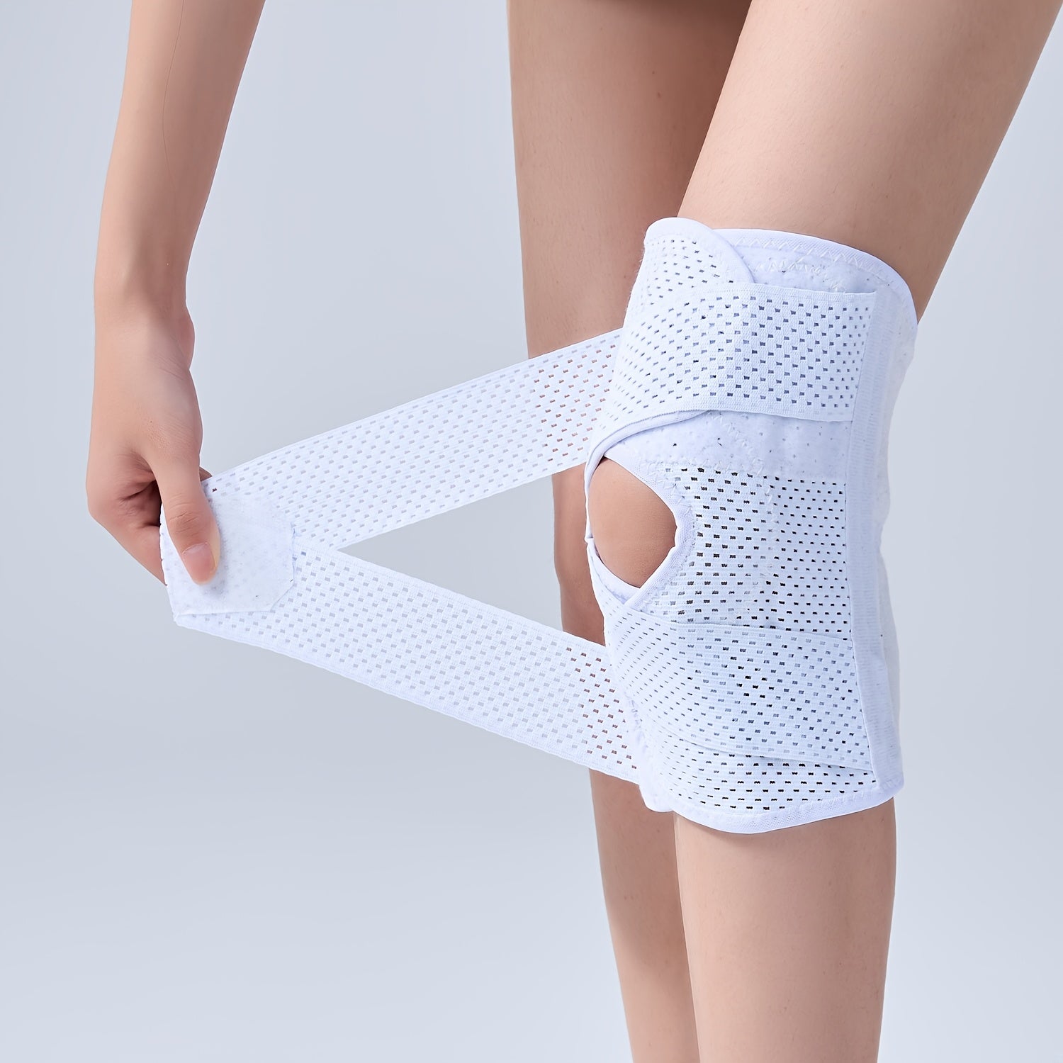 Genouillère élastique unisexe, respirante en polyester, maintien sportif pour basketball et activités de plein air variées.