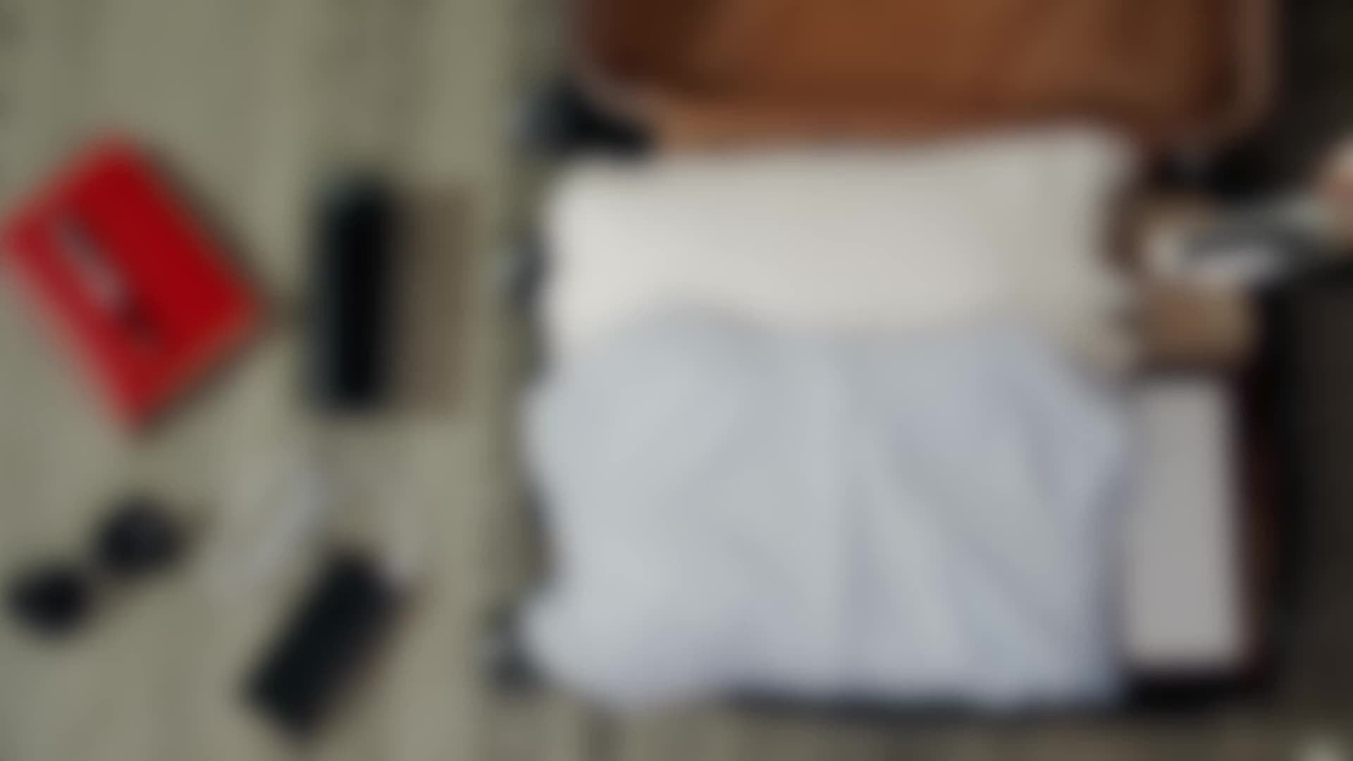 Balance bagages numérique portable, affichage LCD rétroéclairé, capacité 50 kg, crochet pratique, idéale pour peser valises en voyage.