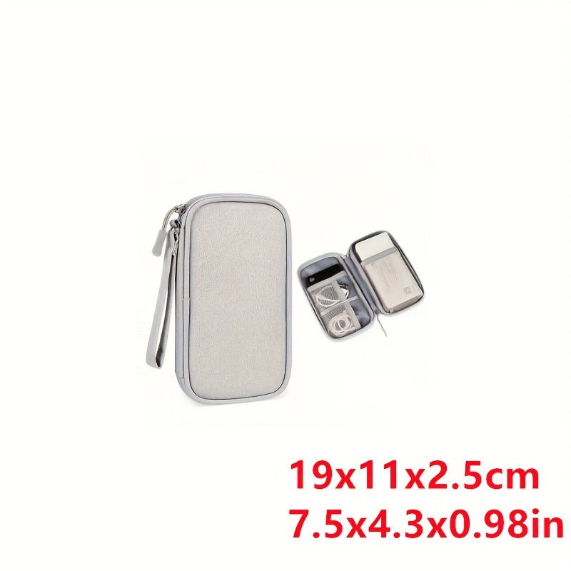 Trousse élégante en tissu avec compartiments multiples – organise câbles, batteries et accessoires, légère, pliable, pratique pour le voyage.