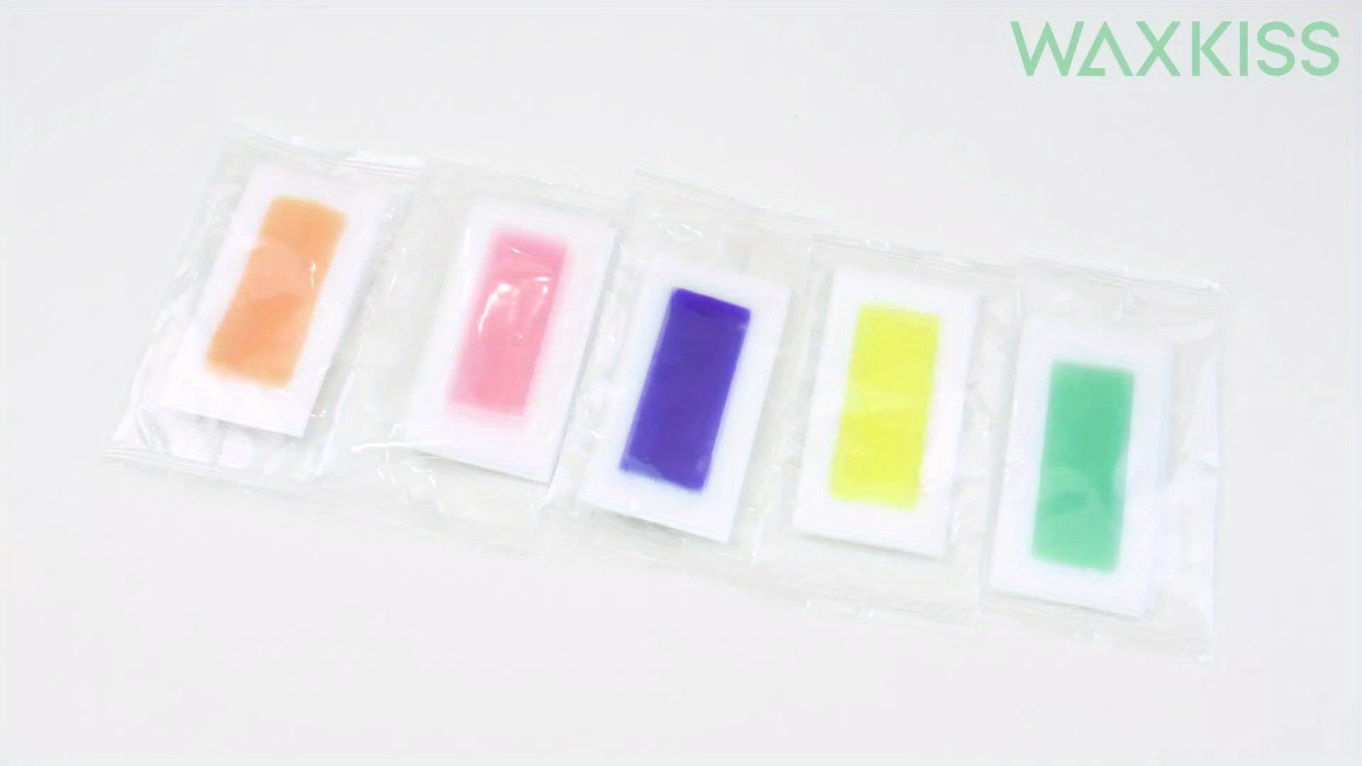 Lot de 20 bandes de cire Waxkiss, pour lèvres, barbe, sourcils et maillot, mélange gentiane et ortie, parfum aloe/rose/citron, usage multi-peaux beige clair.