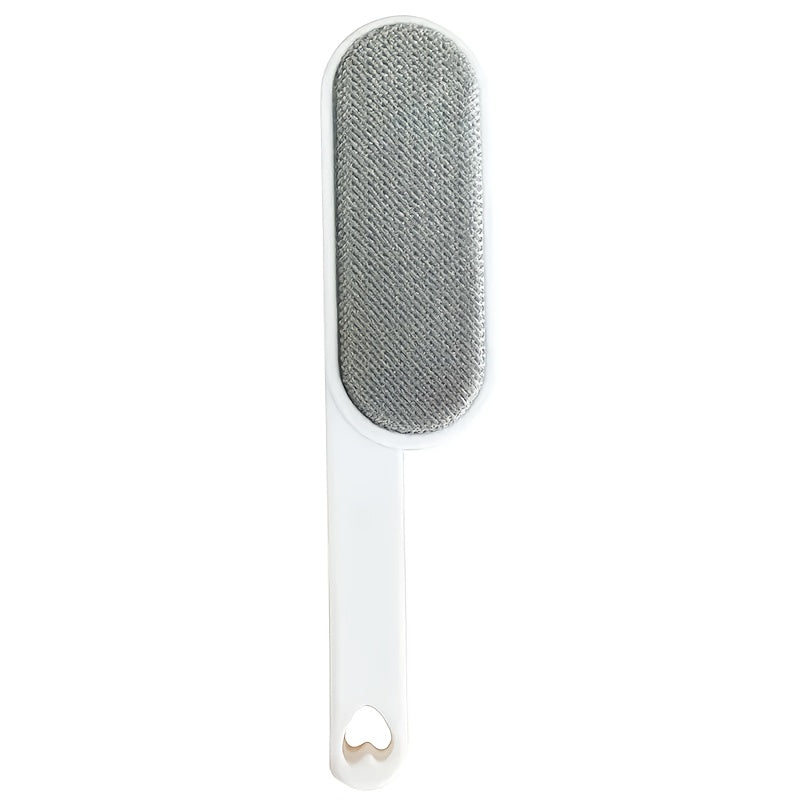 Brosse manuelle à double face pour poils et peluches. Bristles robustes, sans électricité, idéale pour vêtements, meubles, tapis et voyages.