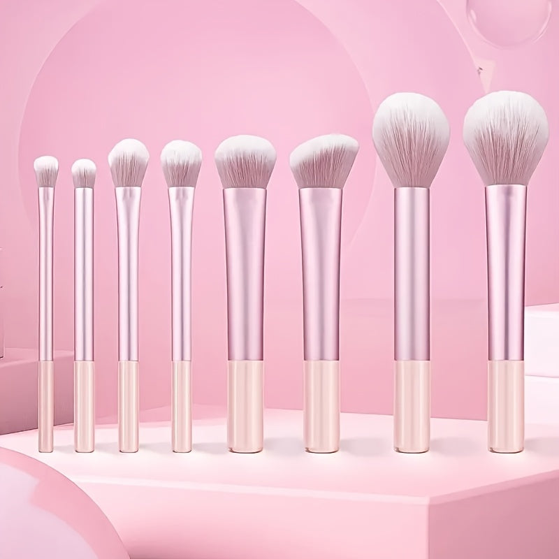Set portable de 8 pinceaux maquillage, manches synthétiques légers et résistants, poils doux de qualité supérieure, couleurs variées.