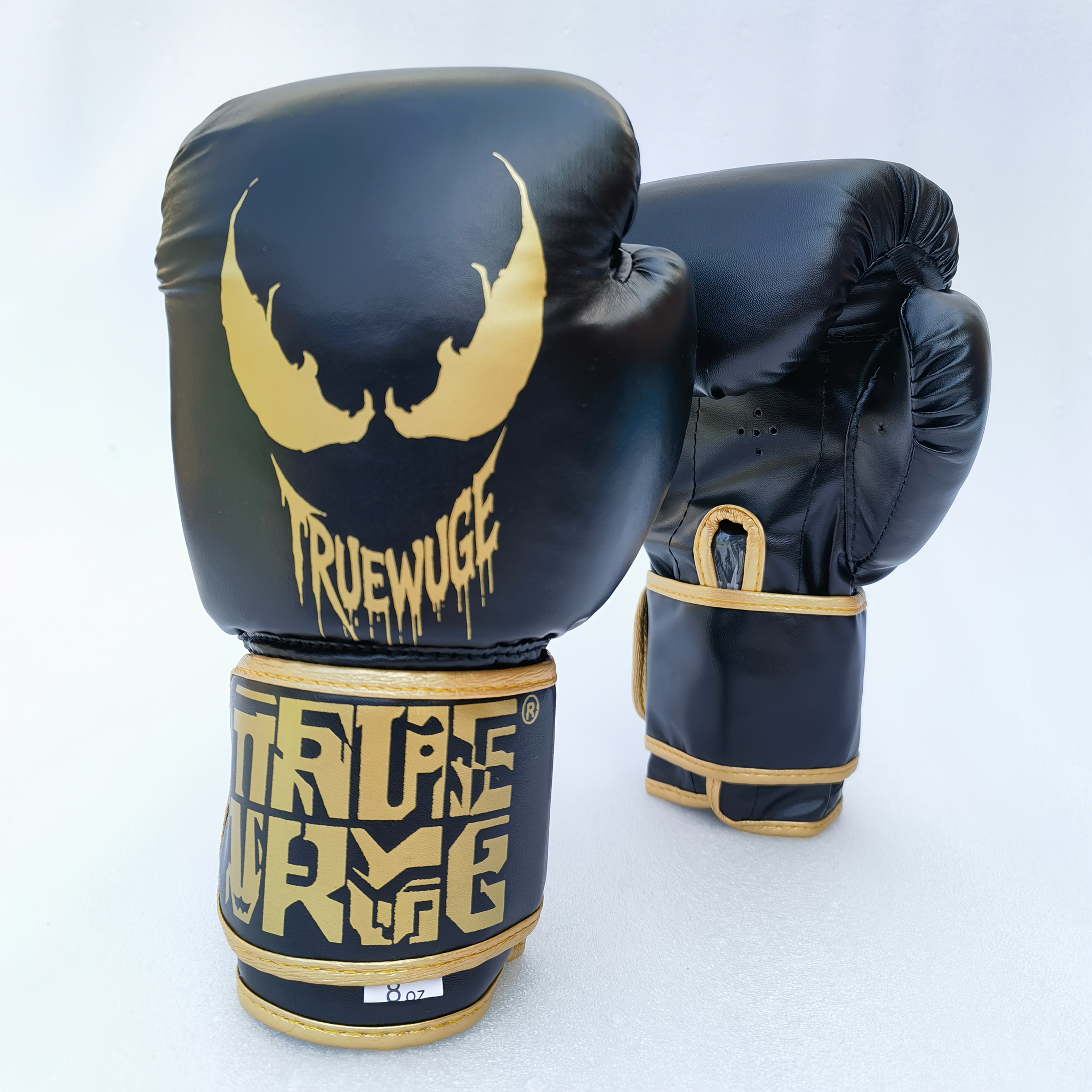 Paire de gants de boxe professionnels en PU ajustables, durables, conçus pour l’entraînement fitness et la pratique de sports de combat à domicile.