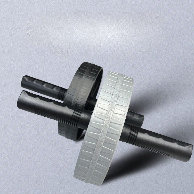 Roller abdominal efficace, design gris et noir, outil de fitness pour renforcer le core, entraîner les muscles et favoriser la perte de poids.