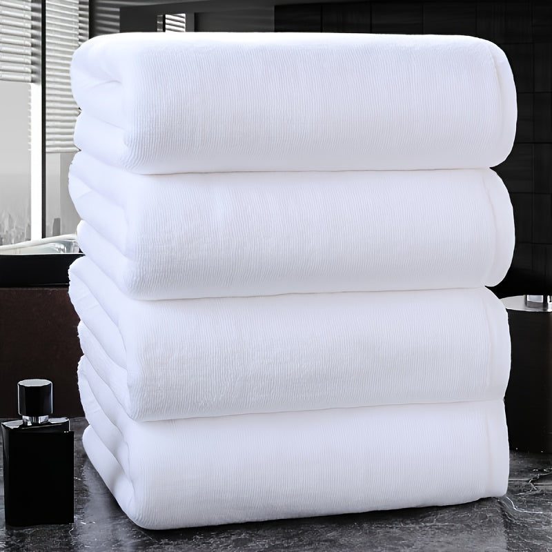 Lot de 4 serviettes de bain surdimensionnées, douces et absorbantes, séchage rapide, 70×30 cm, idéales maison ou hôtel, texture moelleuse.