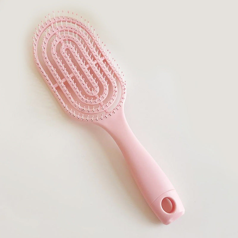 Brosse démêlante pour cheveux bouclés et lisses, adaptée cheveux secs ou mouillés, convient à tous types de cheveux.