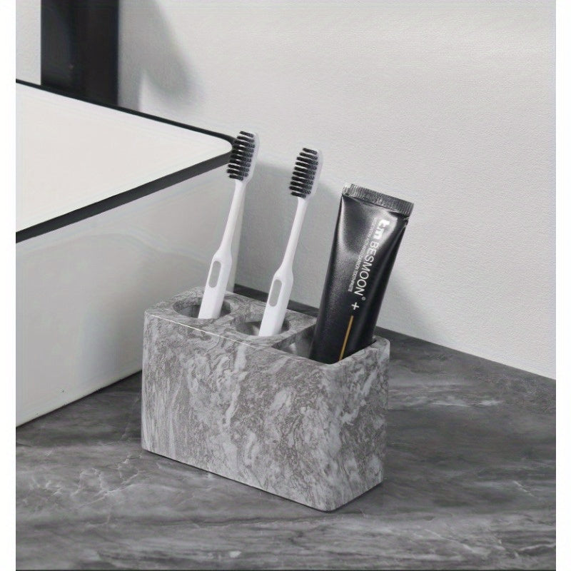 Porte-brosses à dents en résine 3 compartiments Design marbré avec touches dorées, rangement stable pour brosses et dentifrice, accessoire durable et élégant pour salle de bain.