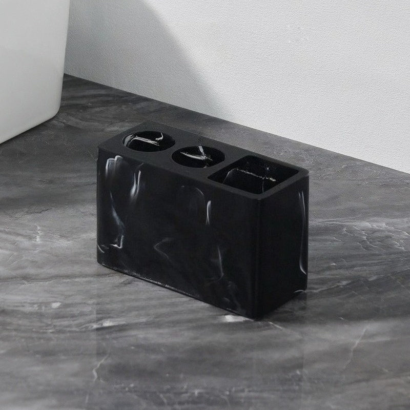 Porte-brosses à dents en résine 3 compartiments Design marbré avec touches dorées, rangement stable pour brosses et dentifrice, accessoire durable et élégant pour salle de bain.