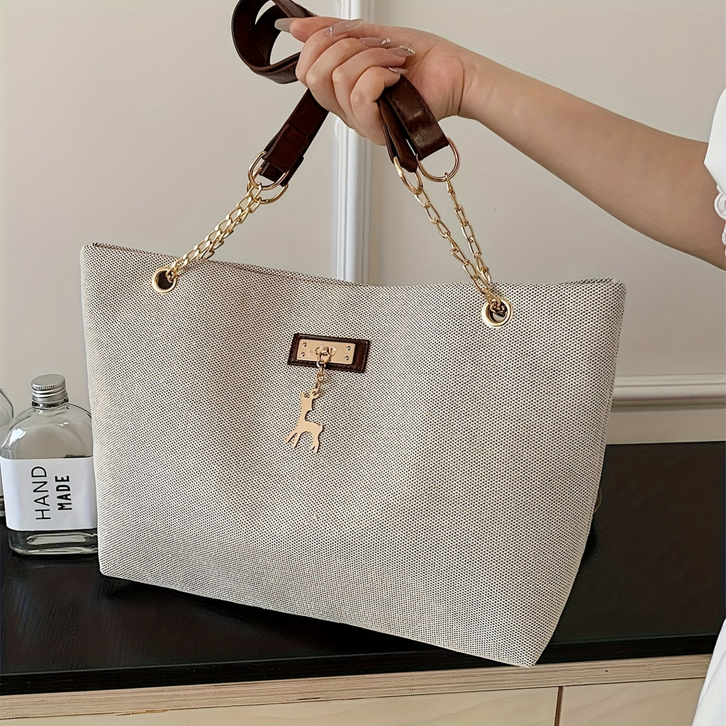 Sac fourre-tout en polyester tendance, grande capacité, bandoulière réglable, fermeture zippée, orné d’un charm cerf, style besace pour femme.