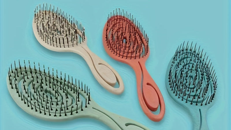 Peigne coiffure oval ajouré, démêlage facile pour cheveux secs ou mouillés, design ergonomique et pratique.