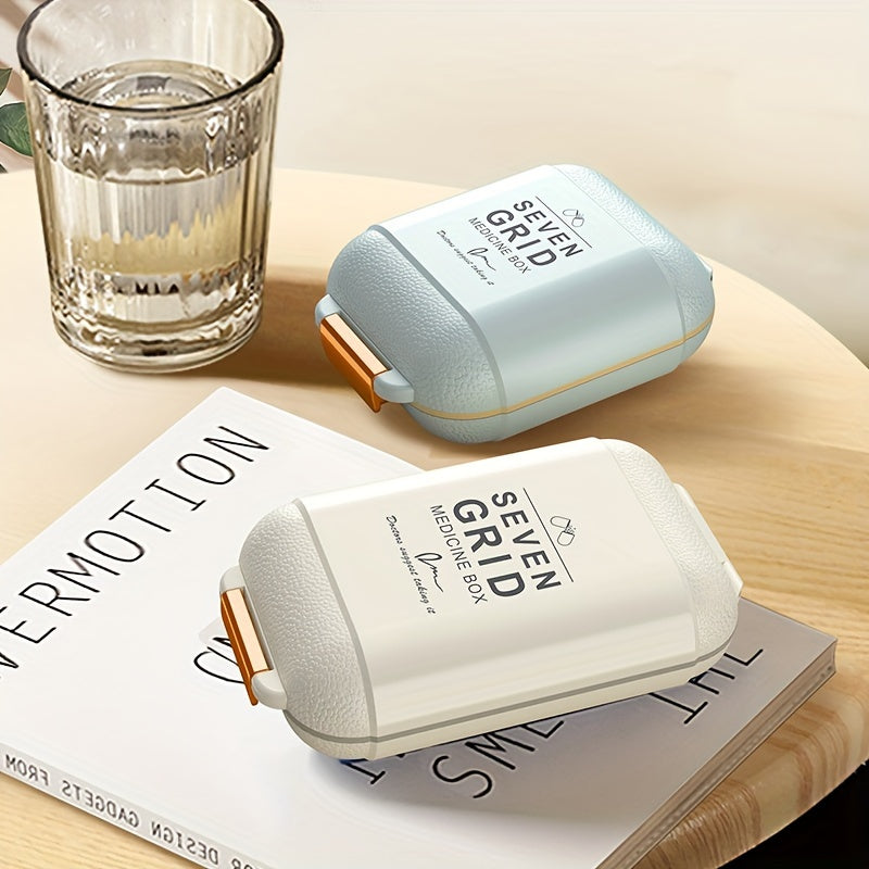 Boîte à pilules 7 jours avec poignées orange, grande capacité, anti-poussière et humidité, idéale pour vitamines et médicaments en voyage.