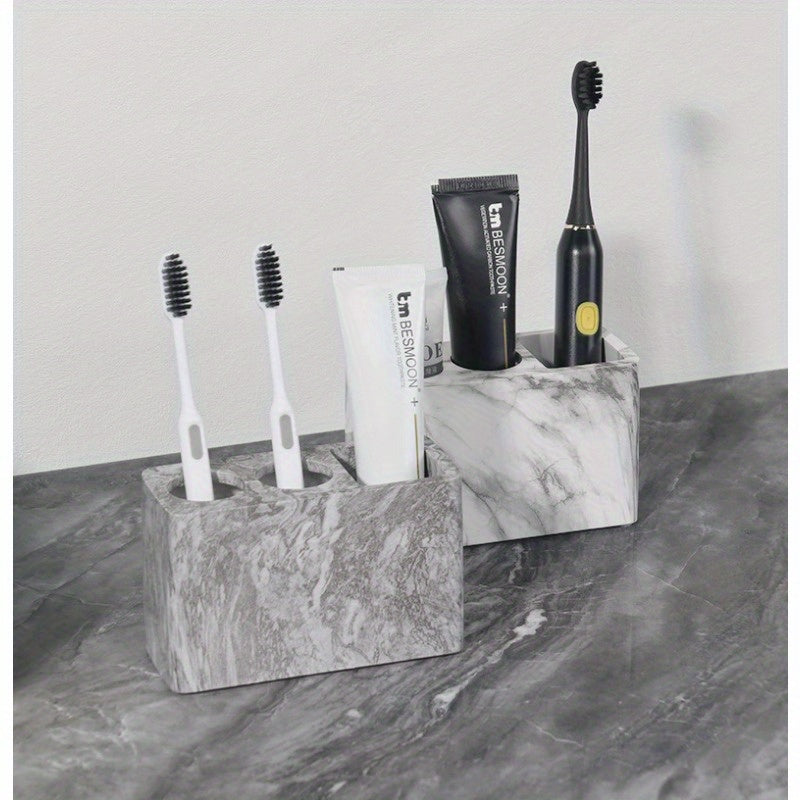 Porte-brosses à dents en résine 3 compartiments Design marbré avec touches dorées, rangement stable pour brosses et dentifrice, accessoire durable et élégant pour salle de bain.