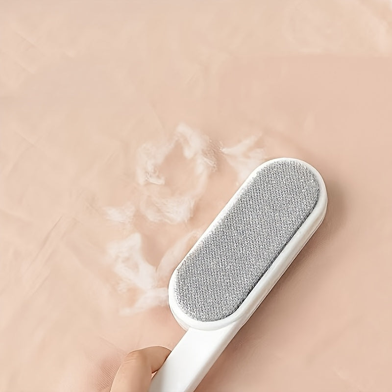 Brosse manuelle à double face pour poils et peluches. Bristles robustes, sans électricité, idéale pour vêtements, meubles, tapis et voyages.