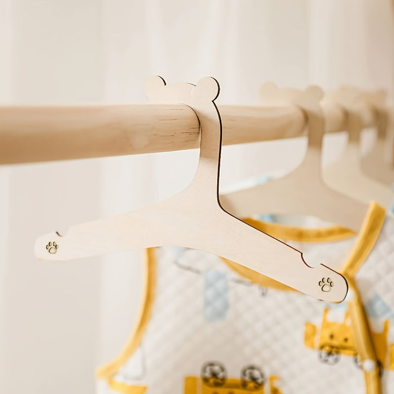Lot de 20 cintres en bois forme ours, durables et polis, parfaits pour vêtements enfants, animaux et accessoires, décoration de chambre ou placard.