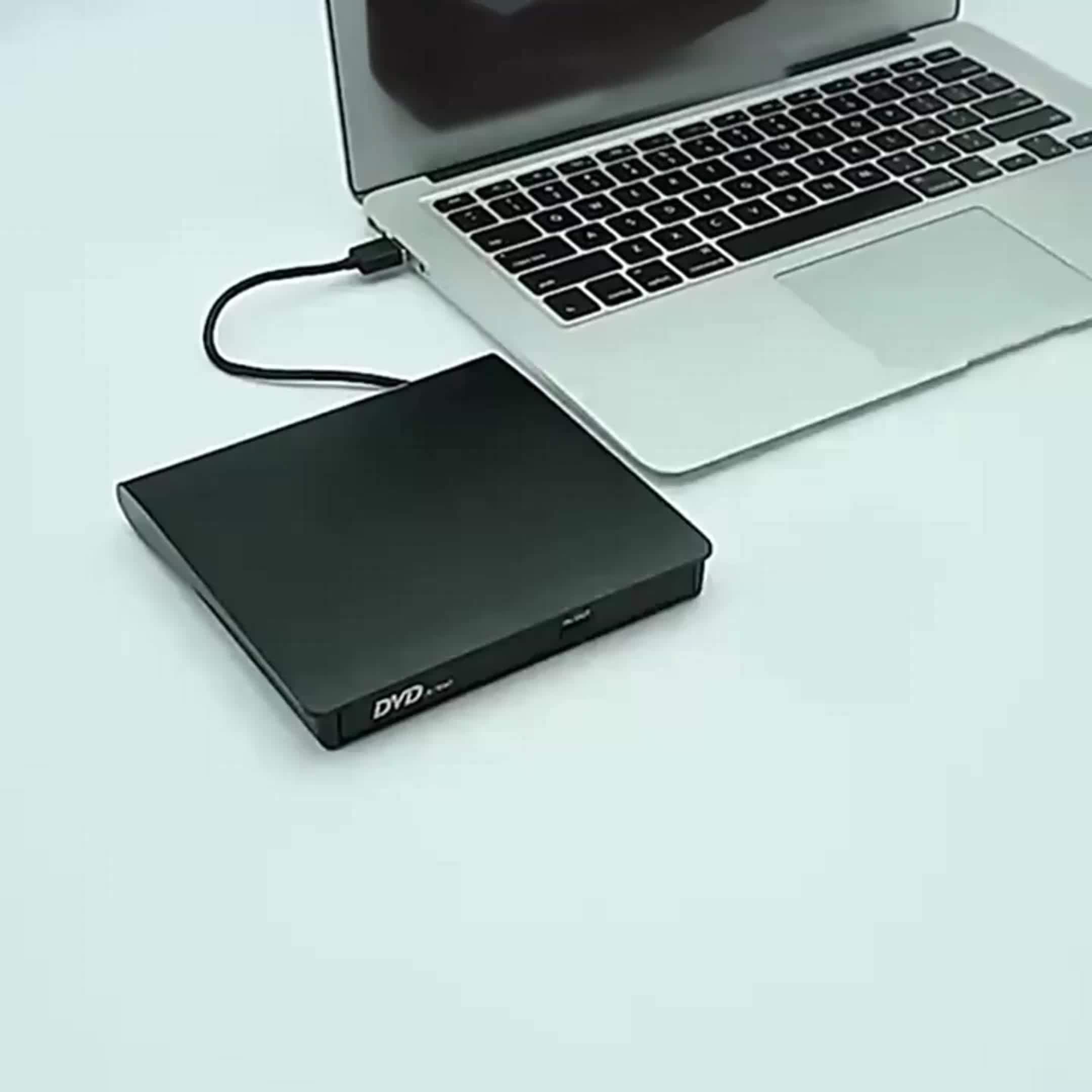 Lecteur/Graveur CD/DVD Externe USB 2.0 : Design slim et portable, compatible PC et laptop, lecture et gravure CD-RW/DVD-RW facile.