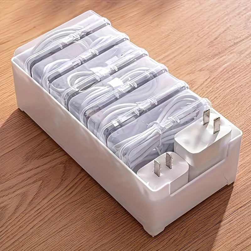 Ensemble de boîtes de rangement pour câbles permettant une organisation professionnelle des chargeurs, alimentations et câbles sur bureau avec gestion optimale des fils.