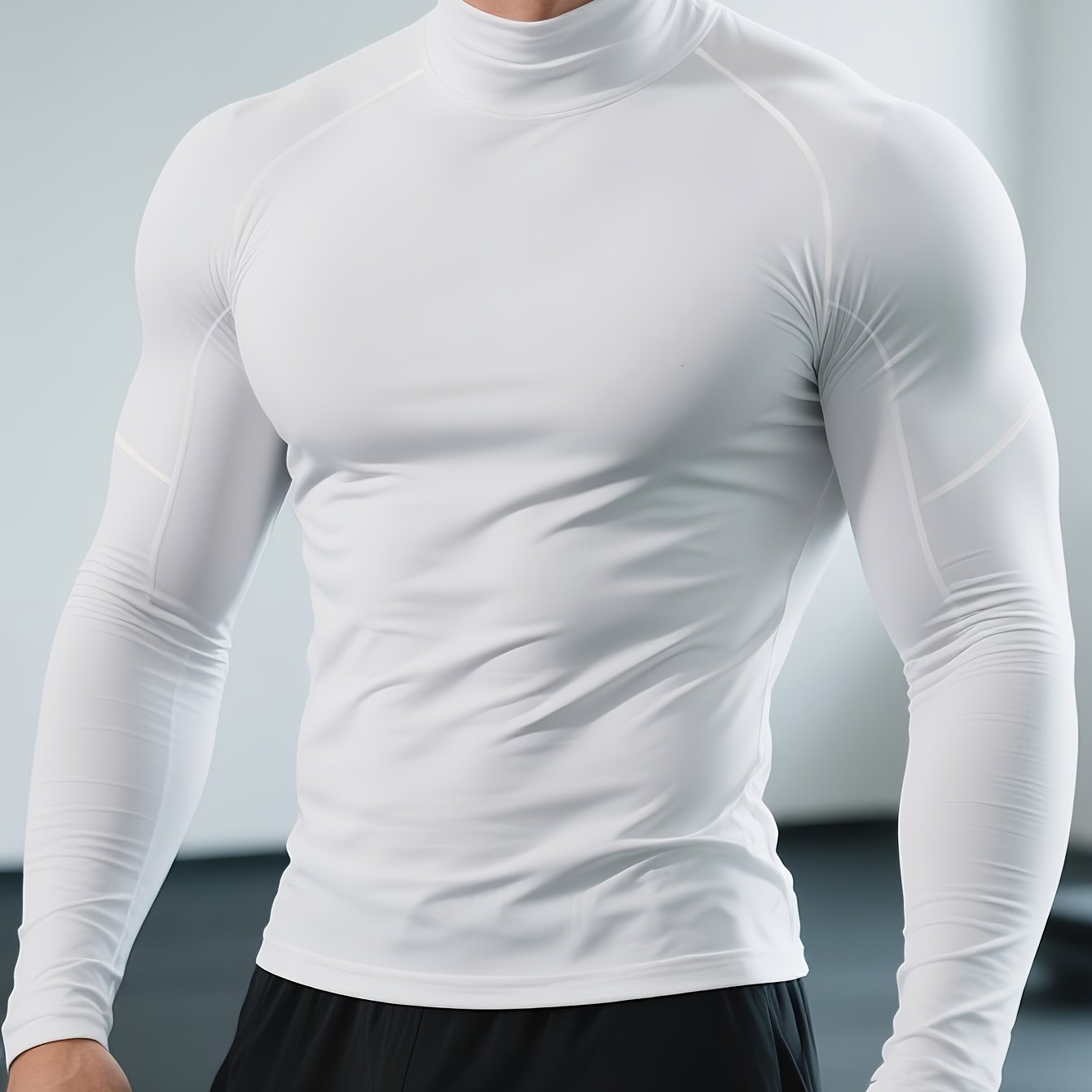 T-shirt de fitness homme à séchage rapide, col haut et manches longues, ajusté, parfait pour le gym, boxe et entraînements toute saison.