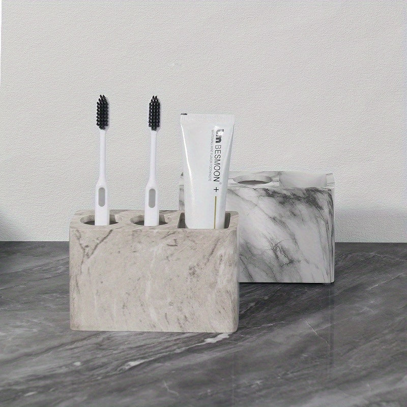 Porte-brosses à dents en résine 3 compartiments Design marbré avec touches dorées, rangement stable pour brosses et dentifrice, accessoire durable et élégant pour salle de bain.