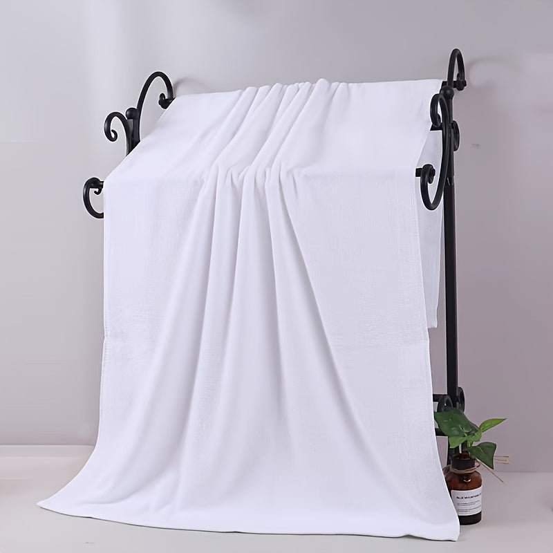 Lot de 4 serviettes de bain surdimensionnées, douces et absorbantes, séchage rapide, 70×30 cm, idéales maison ou hôtel, texture moelleuse.