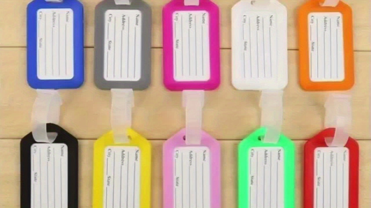 Lot de 10 étiquettes bagages en plastique, pratiques pour valises et sacs, avec identification nom et adresse, usage voyage ou bureau.