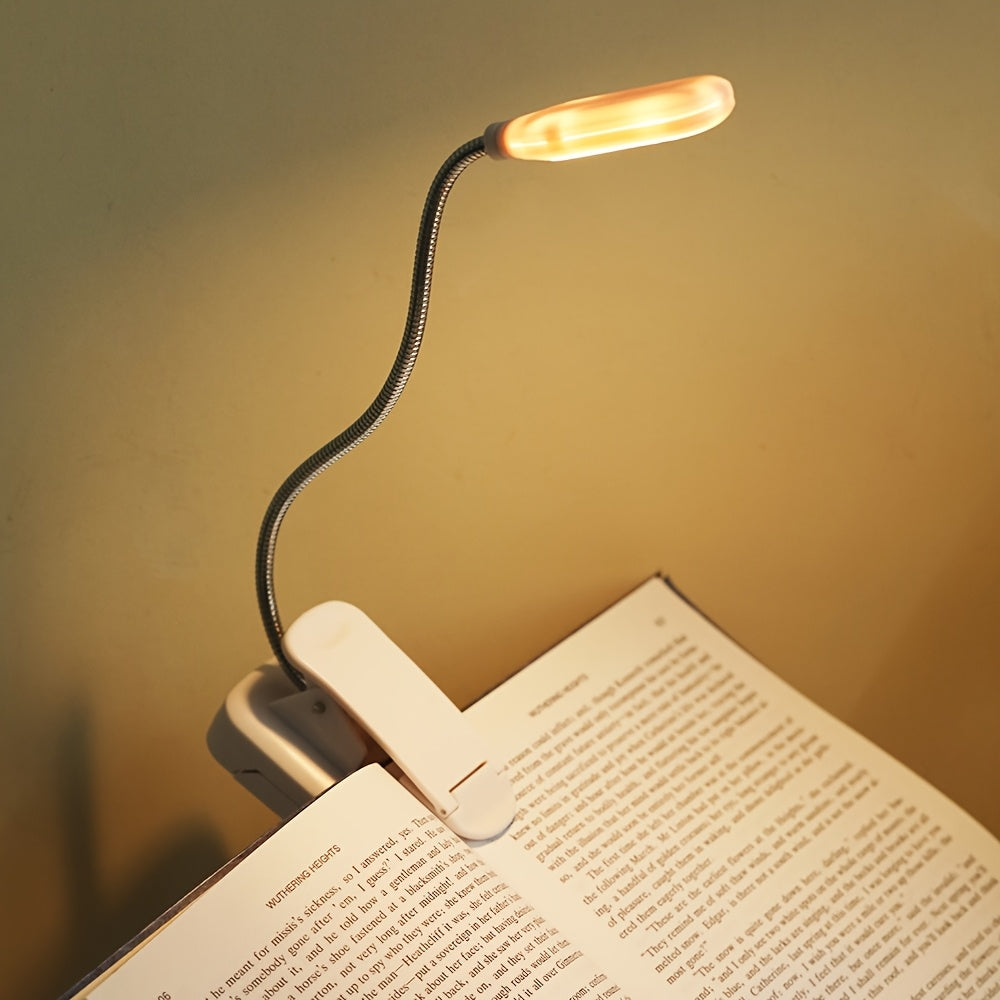 Lampe de bureau LED avec pince Bras ajustable, fonctionnement sur piles, bouton-poussoir, design ergonomique et moderne, idéale pour lecture, chevet ou espace de travail.