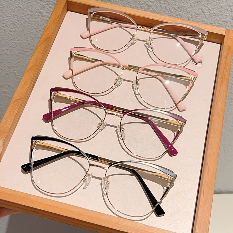 Paire de lunettes style œil de chat pour femmes, monture métallique légère, tendance rétro, couleur rose élégante, sans correction.