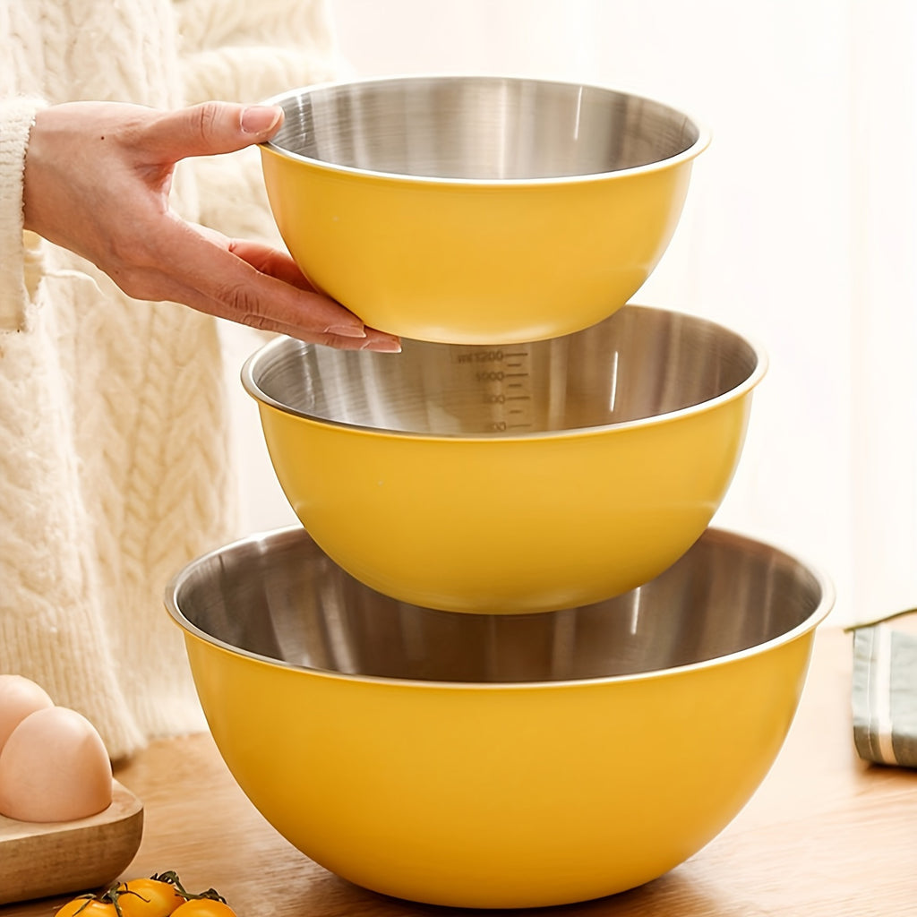 Ustensiles de pâtisserie avec saladier gradué en acier inoxydable, idéal pour mélange, stockage alimentaire et préparation de repas.