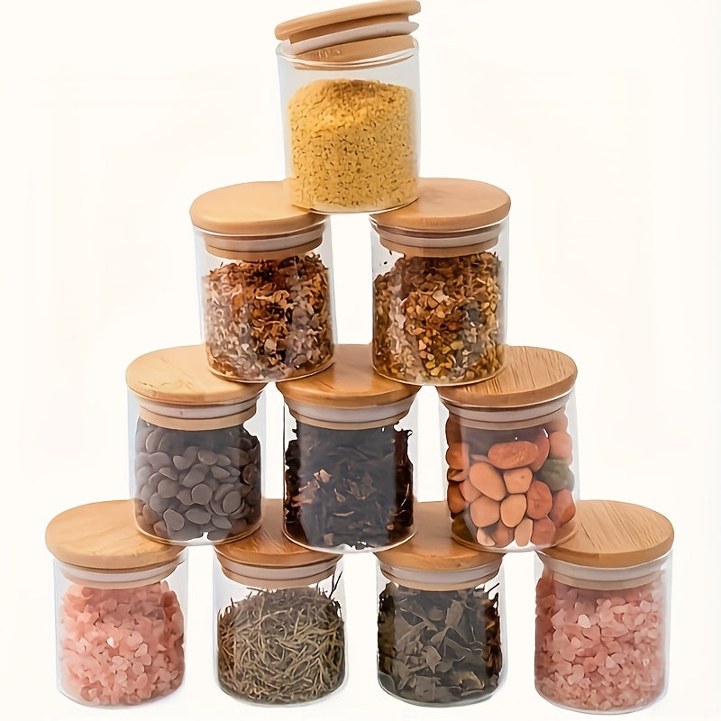 Lot de 4 bocaux de rangement Verre borosilicaté transparent, couvercles bois scellés, idéal pour thé, café, sucre, bonbons, épices, cuisine et organisation maison.