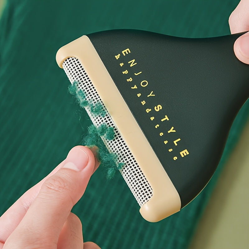 Brosse anti-peluches réversible portable, retire poils d’animaux et fibres, adaptée vêtements, tapis et tissus, usage manuel efficace.