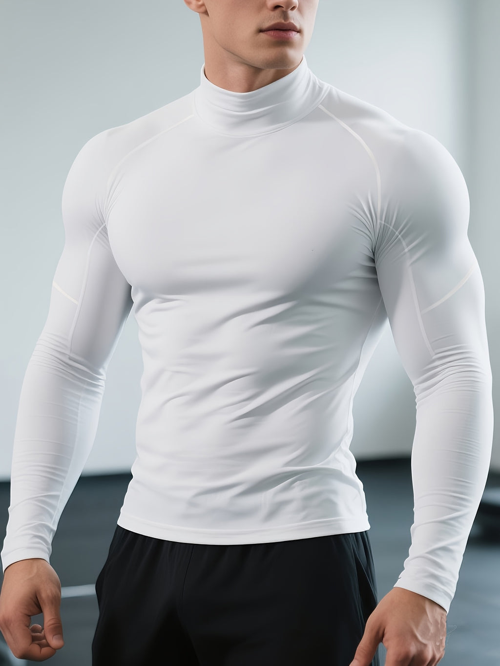T-shirt de fitness homme à séchage rapide, col haut et manches longues, ajusté, parfait pour le gym, boxe et entraînements toute saison.