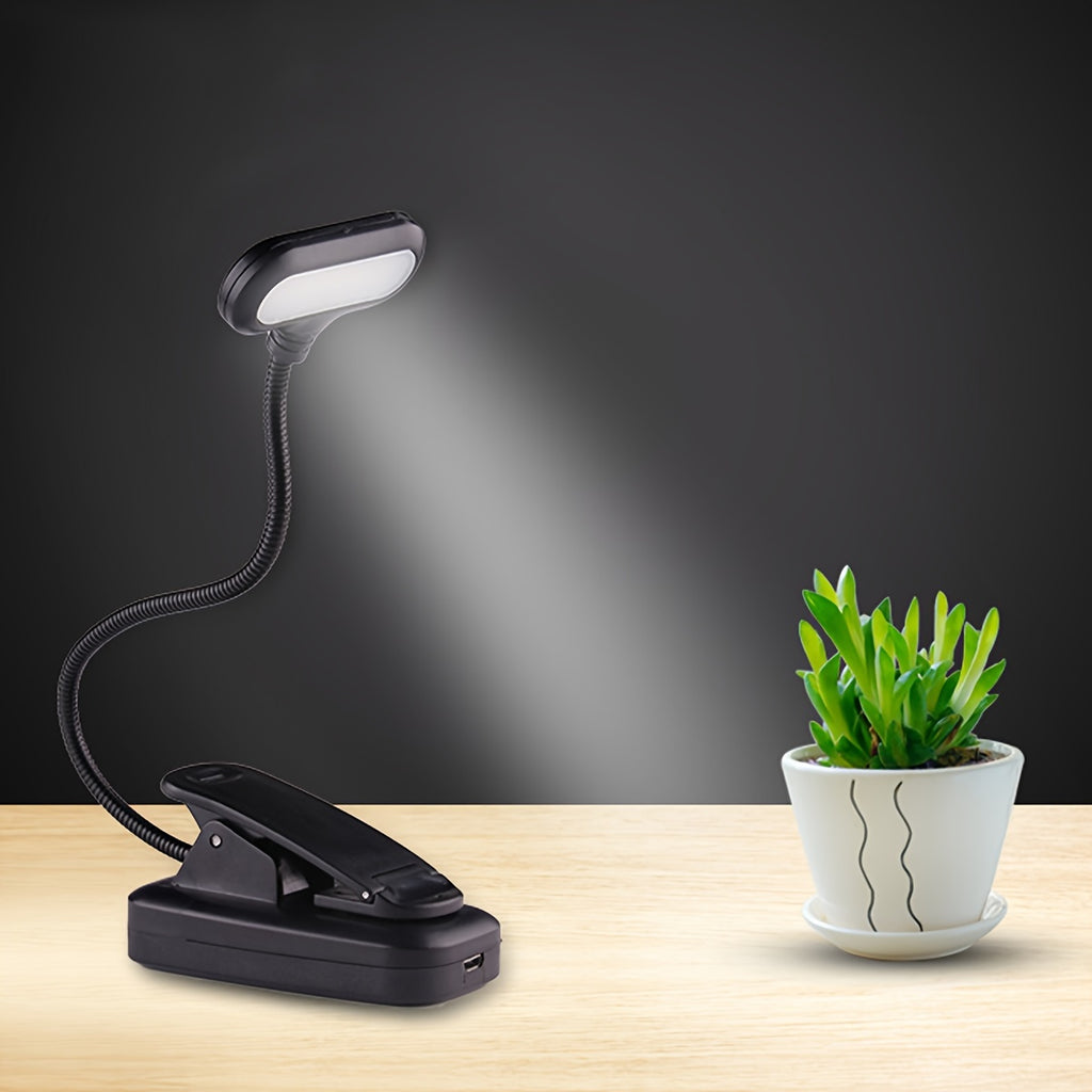 Lampe de bureau LED avec pince Bras ajustable, fonctionnement sur piles, bouton-poussoir, design ergonomique et moderne, idéale pour lecture, chevet ou espace de travail.
