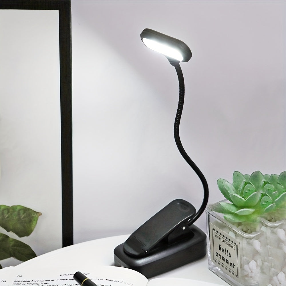 Lampe de bureau LED avec pince Bras ajustable, fonctionnement sur piles, bouton-poussoir, design ergonomique et moderne, idéale pour lecture, chevet ou espace de travail.