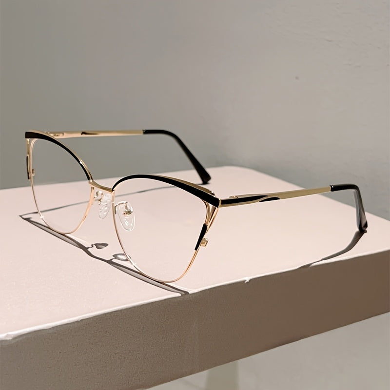 Paire de lunettes style œil de chat pour femmes, monture métallique légère, tendance rétro, couleur rose élégante, sans correction.
