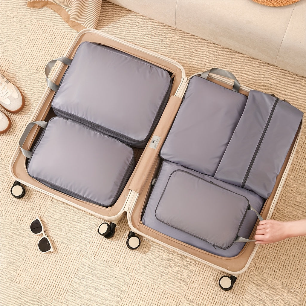 Sacs de rangement de voyage, étanches et portables, pour vêtements, chaussures et articles de toilette, facilitant l’organisation et le packing des bagages.