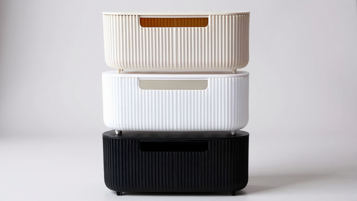 Boîte de rangement durable multifonction pour câbles d’alimentation et de données, design robuste avec surface texturée, pratique pour maison ou bureau.