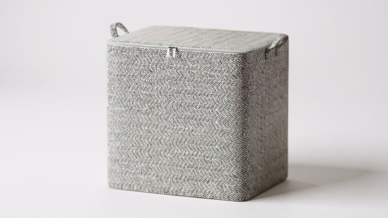 Boîte de rangement extra-large en tissu non tissé résistant avec couvercle, conçue pour organiser vêtements, literie et accessoires tout en économisant l’espace.