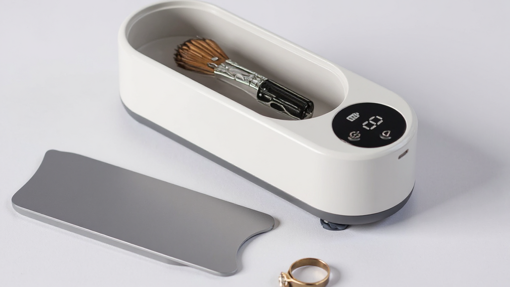 Machine de nettoyage multifonction portable, rechargeable USB, vibration haute fréquence, idéale pour bijoux, lunettes, montres et usage domestique.